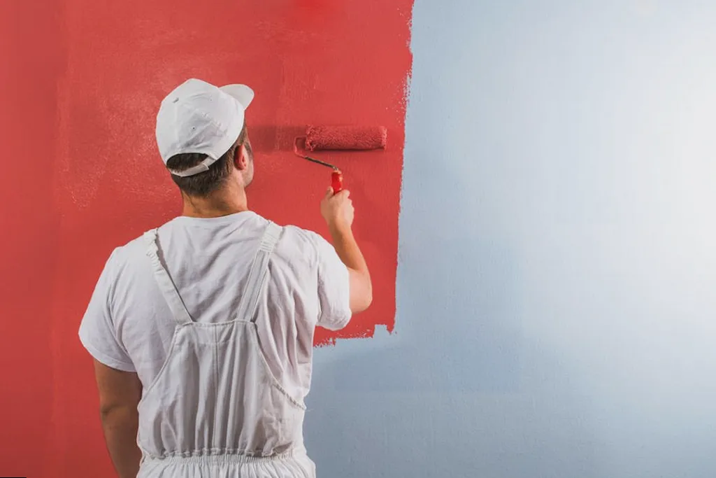 Equipo de pintor trabajando en Anglès